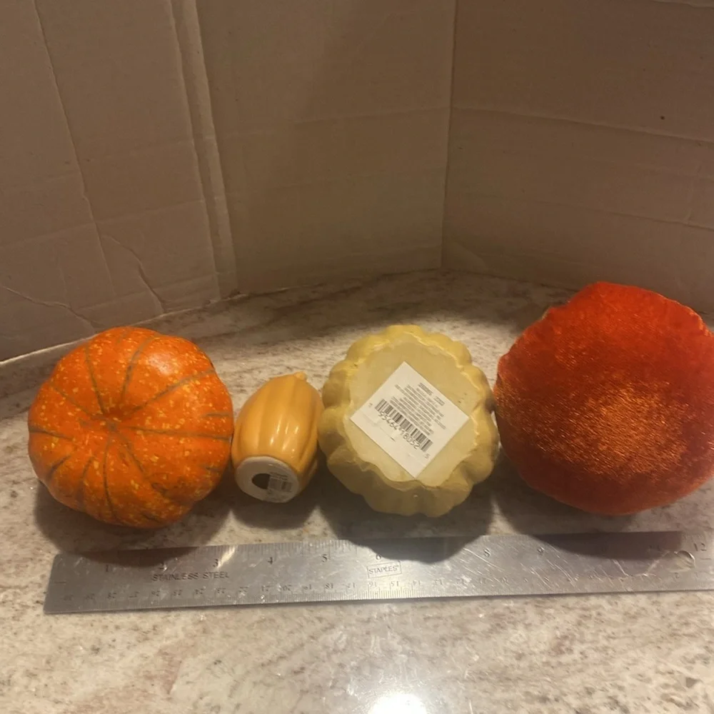 Set of 4 festive pumpkins. Great for fall decorating. Various sizes & materials.